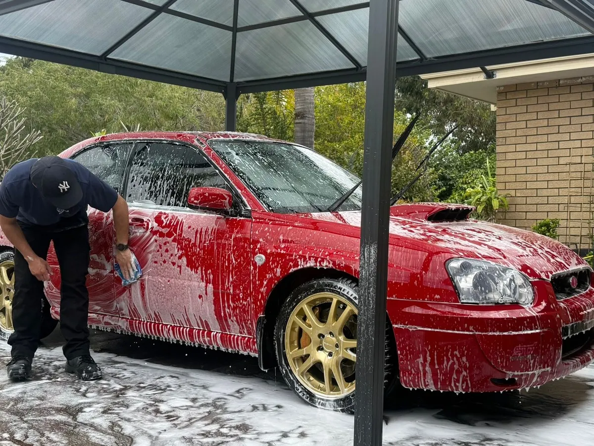 Snow foam pre-wash on a Subaru WRX at DriveHQ Detailing Co. in Dianella