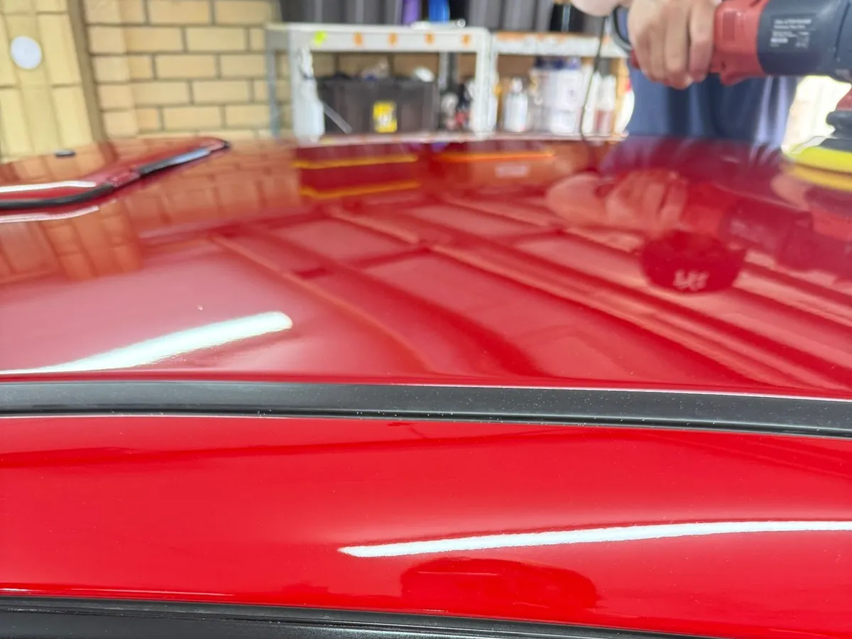 Machine polishing the roof of a Subaru WRX at DriveHQ Detailing Co. in Dianella