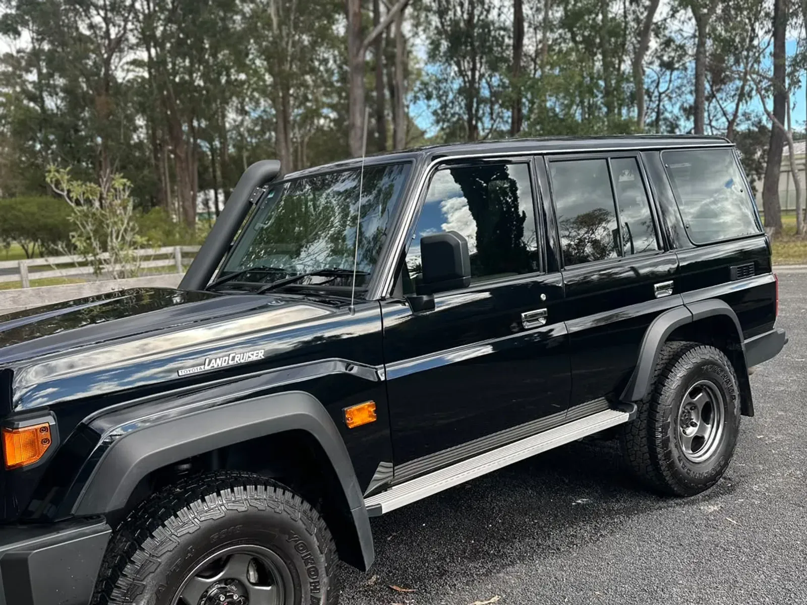Black LandCruiser wagon after a full exterior detail in Grafton