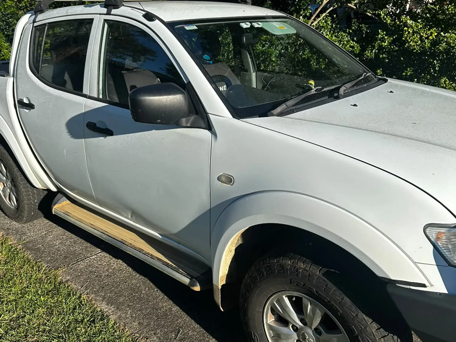 White Mitsubishi Triton detailed in the Clarence Valley