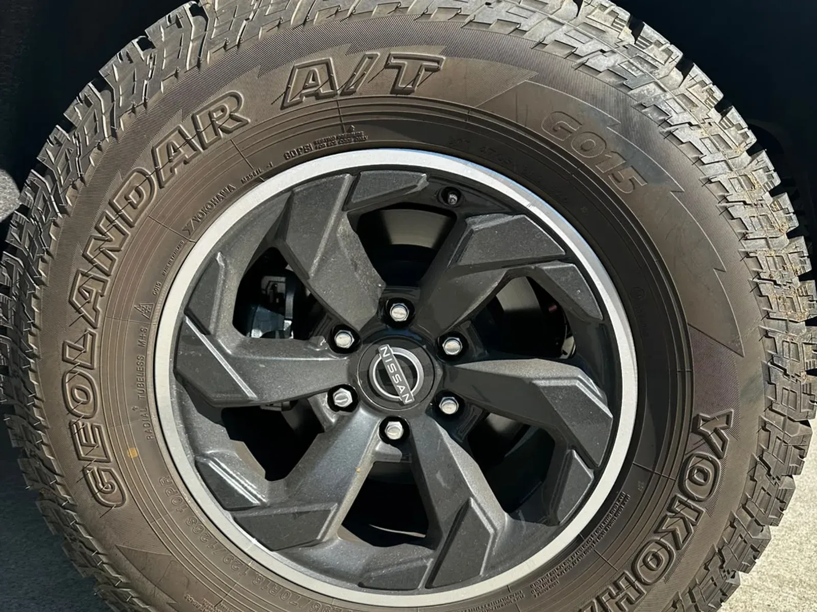 Wheel and all-terrain tyre cleaned and dressed, Grafton