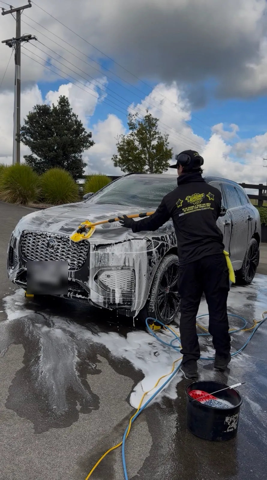Snow foam worked into a Jaguar F-Pace during a pre-wash