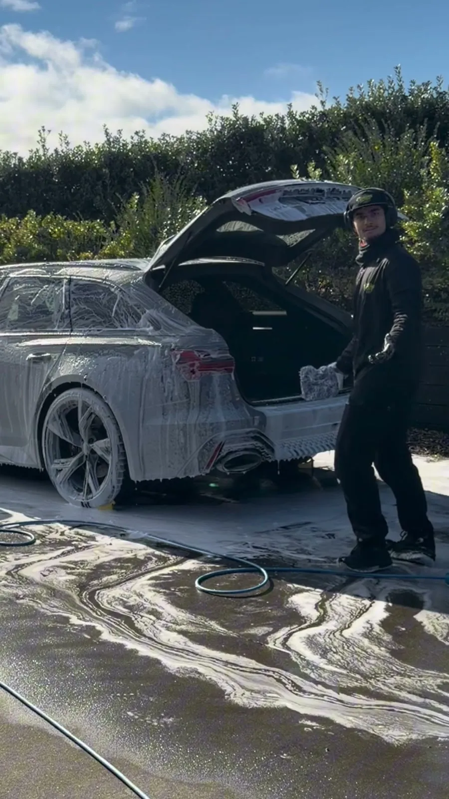 Audi RS6 under snow foam during a full detail