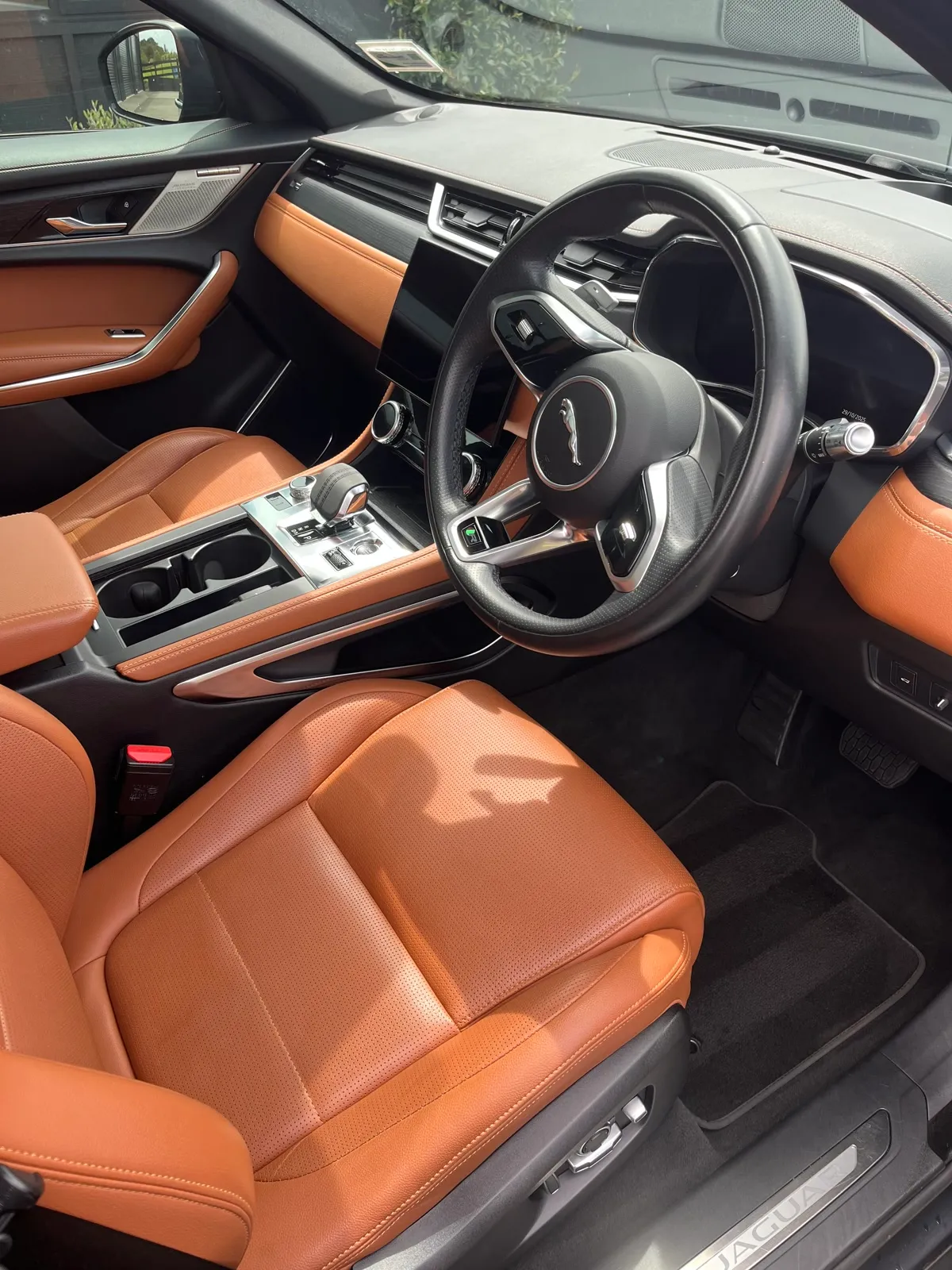 Tan leather interior after an interior detail in Auckland